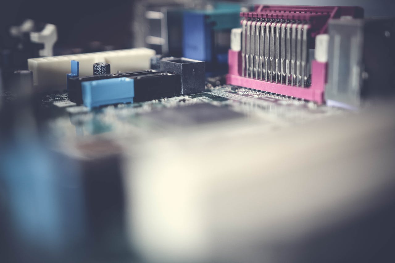 Detailed close-up of a circuit board showcasing electronic components in soft focus.