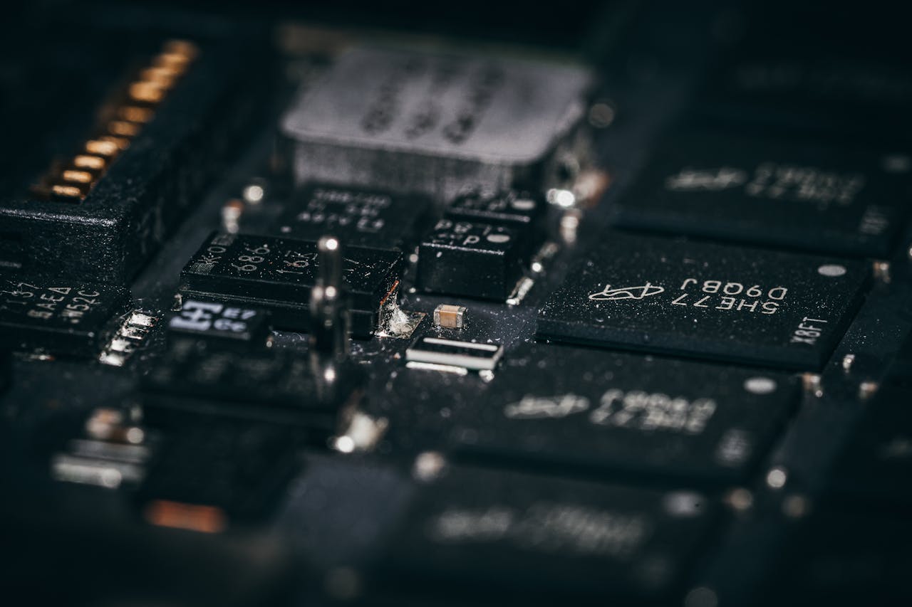 Detailed macro shot of electronic circuit components showcasing intricate design and layout.